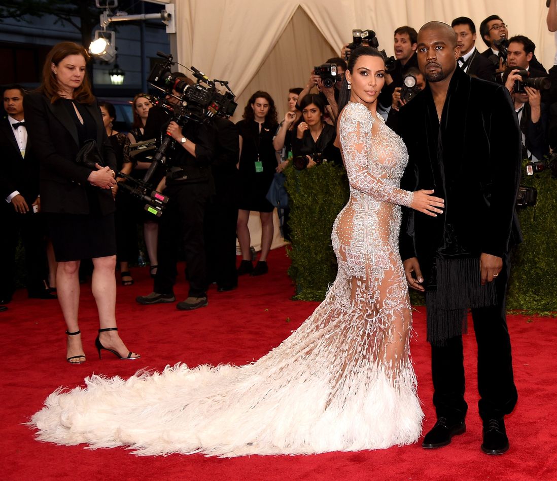 Kim Kardashian West and Kanye West in Roberto Cavalli<br>